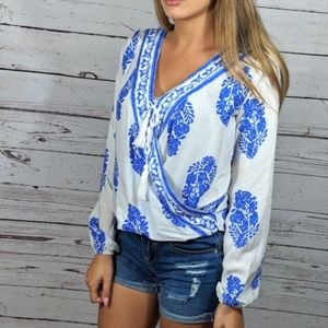 white and blue blouse in women